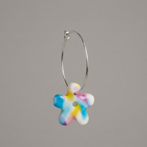 Handmade Buttercup polymer clay hoop flower earrings with stainless steel hoops.